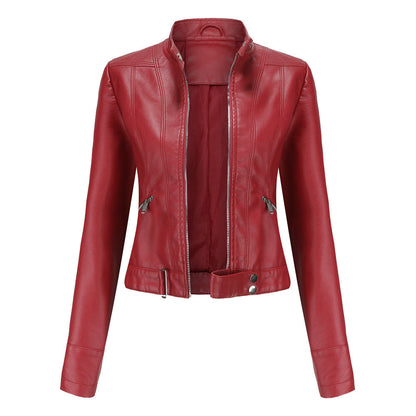 Women's faux leather biker jacket with sleek texture, dual zippers, and flap accents, showcasing a classic edgy style.