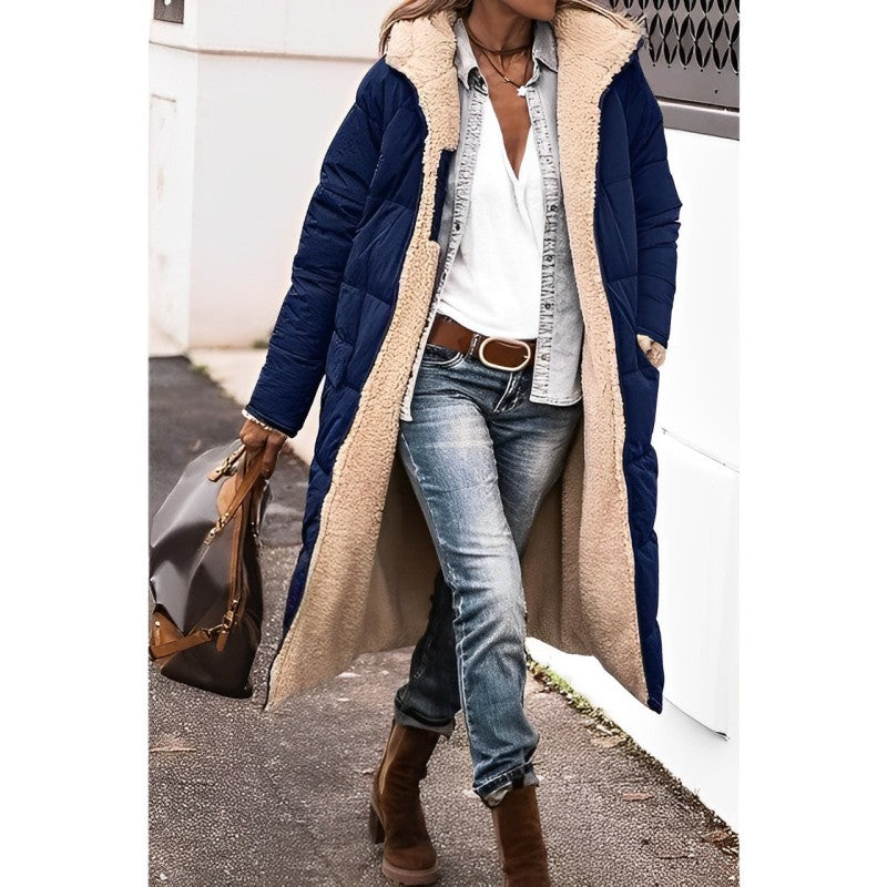 "Women's hooded longline quilted winter coat, front view; insulated, open front design with quilted texture and hood."