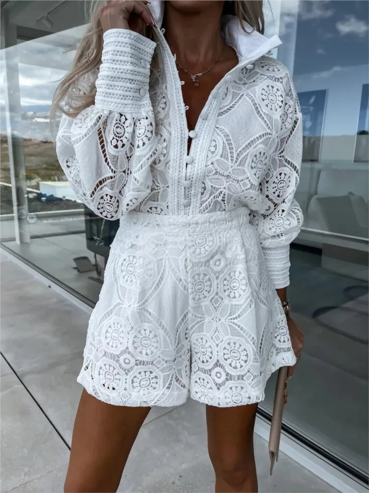 "Women's lace summer set with balloon sleeves, floral lace design, high-waisted shorts, perfect for warm-weather occasions."