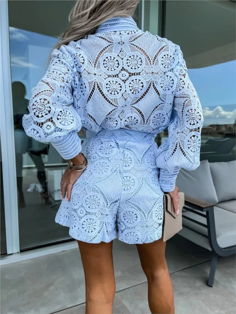 "Women's lace summer set with balloon sleeves, floral lace design, high-waisted shorts, perfect for warm-weather occasions."