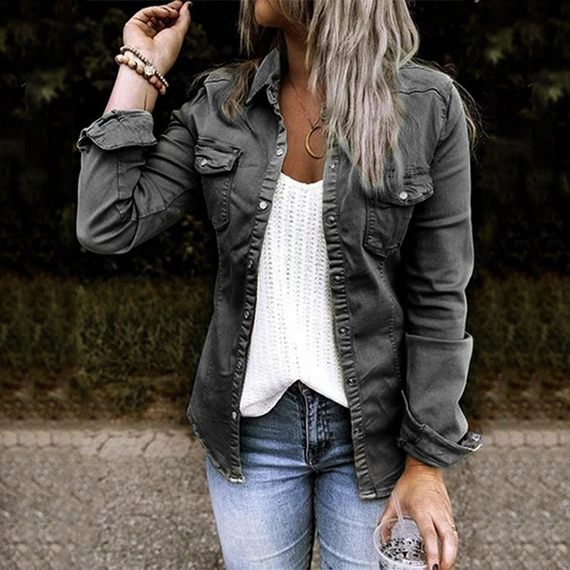 Women's lightweight denim shirt jacket with button front, structured silhouette, and chest pockets for a casual chic look.