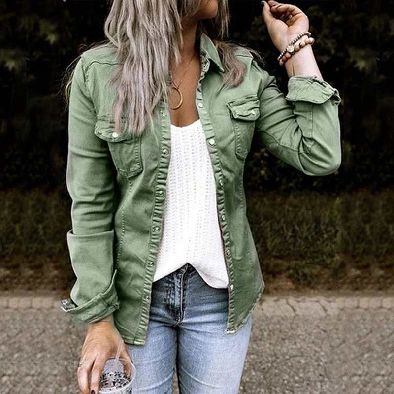 Women's lightweight denim shirt jacket with button front, structured silhouette, and chest pockets for a casual chic look.