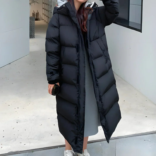 "Women's long puffer jacket, hooded winter coat, front view; insulated, water-resistant, sleek fit for warmth and style."