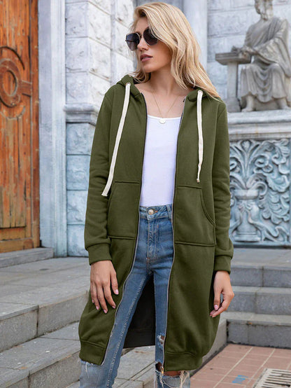Women's longline zip hoodie with drawstring hood, midweight fabric, extended length, cozy style for cooler seasons.