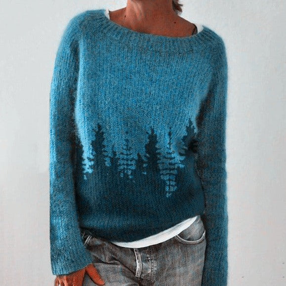 Women's multicolor knit patterned sweater with crew neck, showcasing bold colors and unique design, front view.