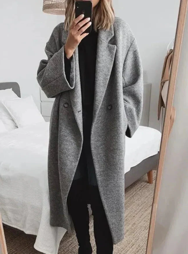 "Women's oversized cashmere coat with lapel collar, soft fabric, relaxed fit, ideal for both casual and professional looks."