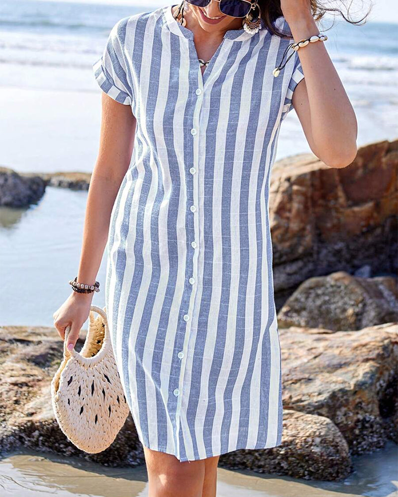 Women's striped V-neck shirt dress in cotton blend with a modern stand collar, front view highlighting tailored design.