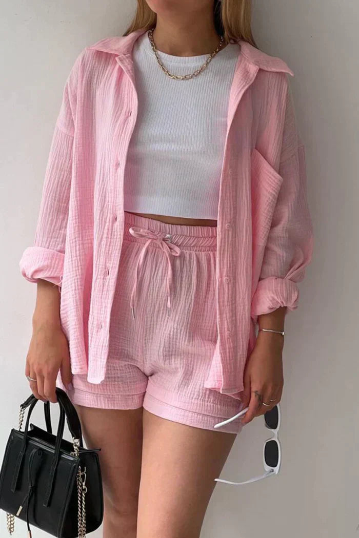 Women's vibrant summer lounge set featuring a button-up shirt and high-waist shorts in a bold, casual style.