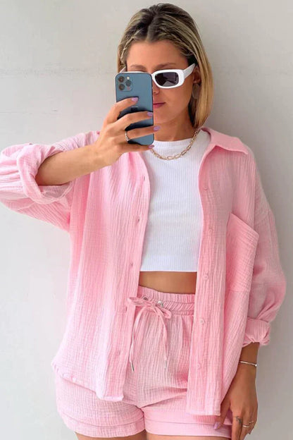 Women's vibrant summer lounge set featuring a button-up shirt and high-waist shorts in a bold, casual style.
