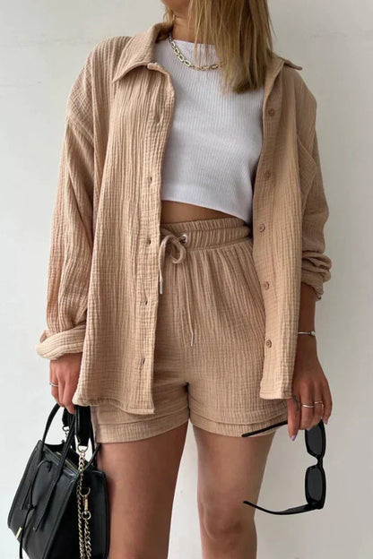 Women's vibrant summer lounge set featuring a button-up shirt and high-waist shorts in a bold, casual style.
