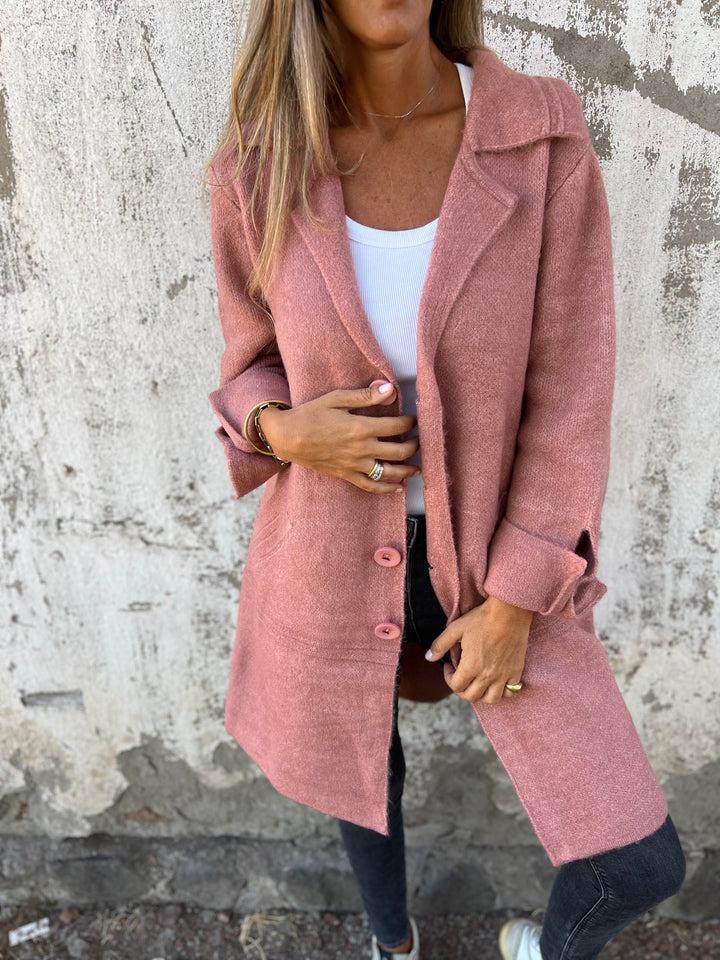 Women's wool-blend button-down jacket, elegant design, classic lapel collar, cuffed sleeves, flattering fit, cozy fabric.
