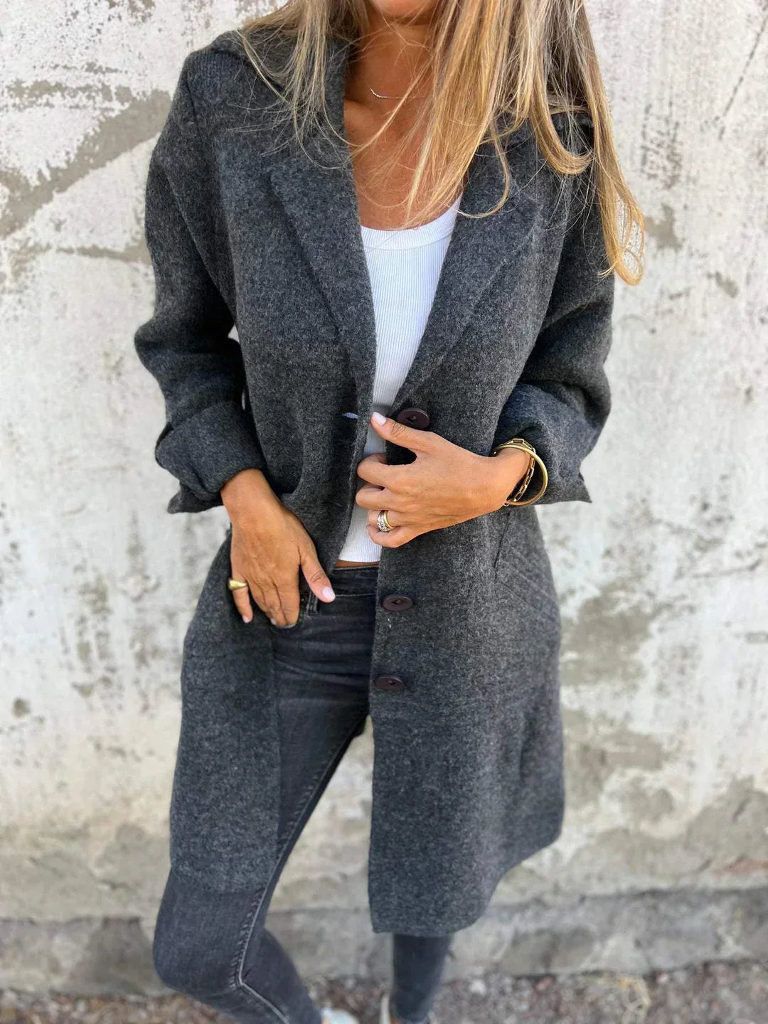 Women's wool-blend button-down jacket, elegant design, classic lapel collar, cuffed sleeves, flattering fit, cozy fabric.
