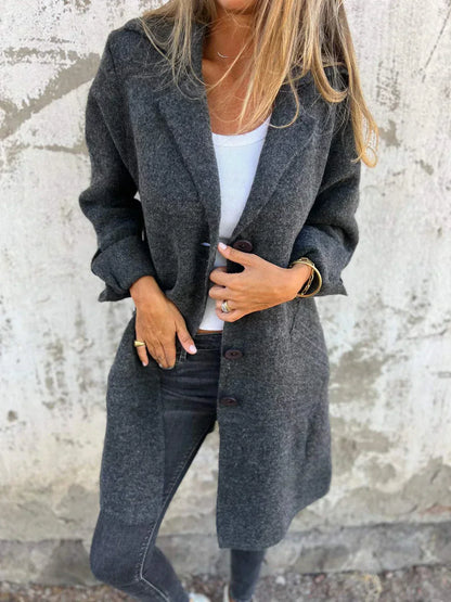 Women's wool-blend button-down jacket, elegant design, classic lapel collar, cuffed sleeves, flattering fit, cozy fabric.
