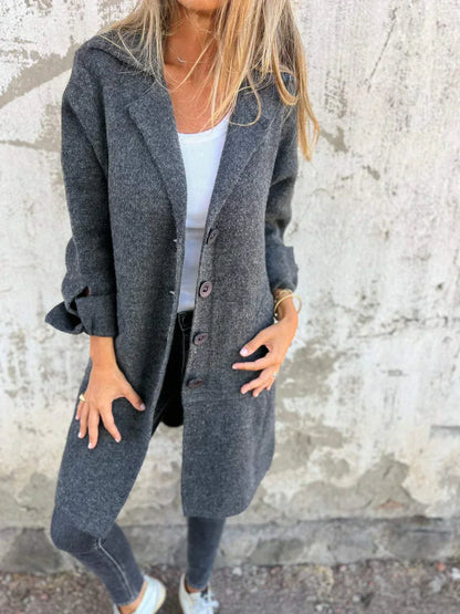 Women's wool-blend button-down jacket, elegant design, classic lapel collar, cuffed sleeves, flattering fit, cozy fabric.