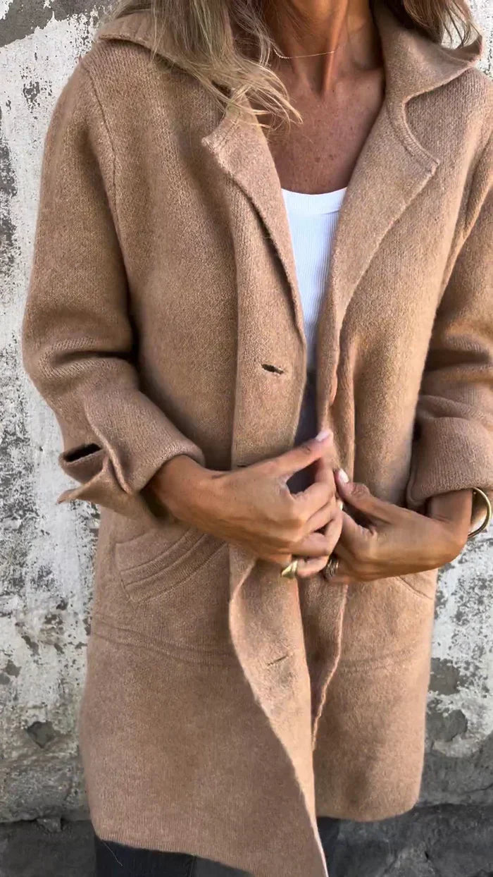 Women's wool-blend button-down jacket, elegant design, classic lapel collar, cuffed sleeves, flattering fit, cozy fabric.